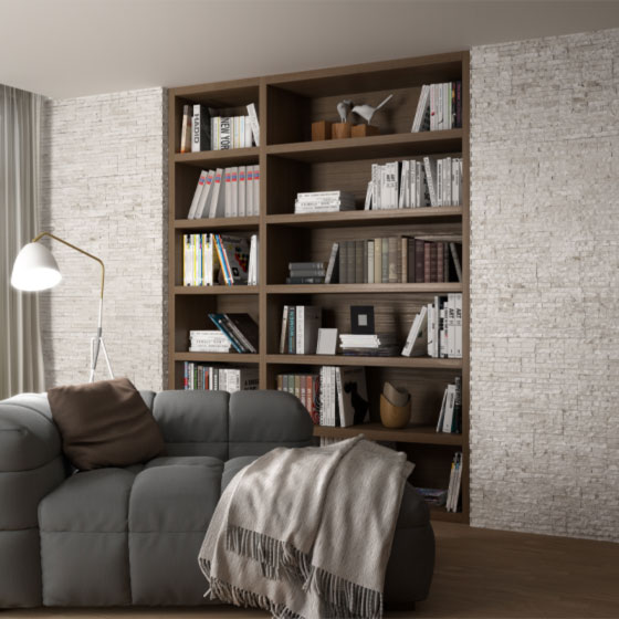Gemütliches Wohnzimmer mit Wandverblender aus Feinsteinzeug in Creme Weiß