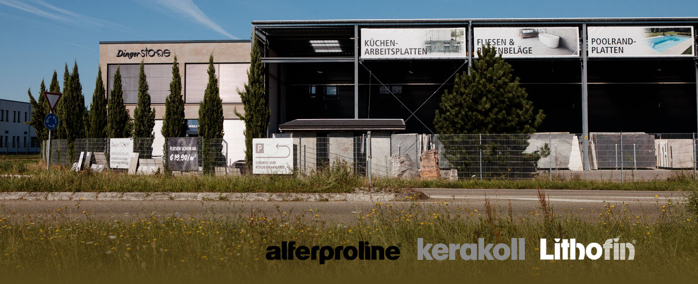 firmenpraesentation-dingerstone-gebaeude-kerakoll-alferproline-lithofin Dinger Stone Gebäude von aussen mit den Logos von Alferproline, Kerakoll und Lithofin